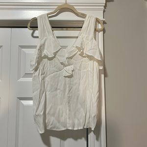 Never worn! White ruffle sleeveless top